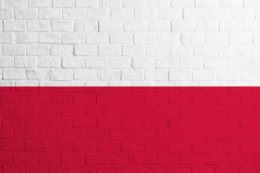 Polonya bayrağı. Polonya bayrağının tuğla duvar dokusu.