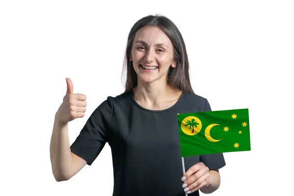 Happy Young White Woman Holding Flag Cocos Islands Shows Class — Stock Photo, Image