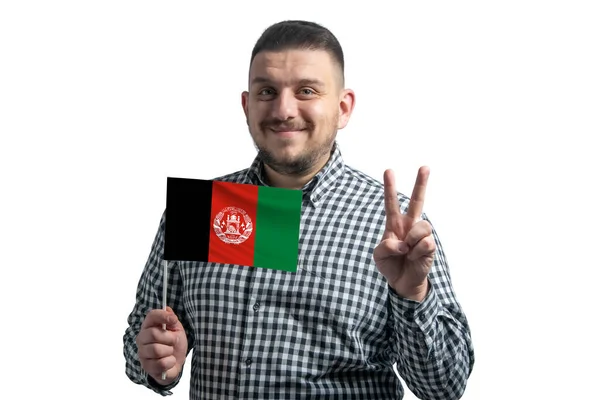 Blanke Man Met Een Vlag Van Afghanistan Toont Twee Vingers — Stockfoto