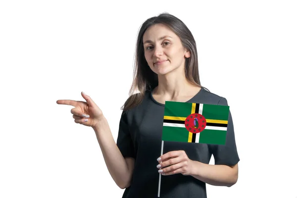 Happy Young White Woman Holding Flag Dominica Points Left Isolated — Stock Photo, Image