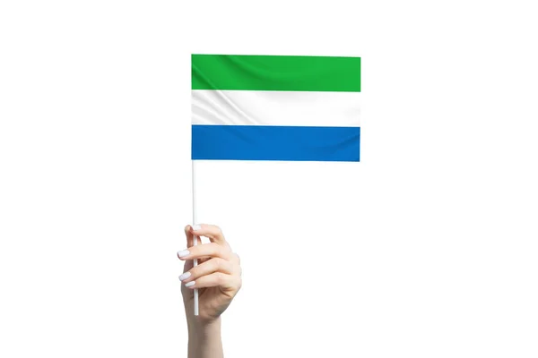Vacker Kvinnlig Hand Håller Sierra Leone Flagga Isolerad Vit Bakgrund — Stockfoto
