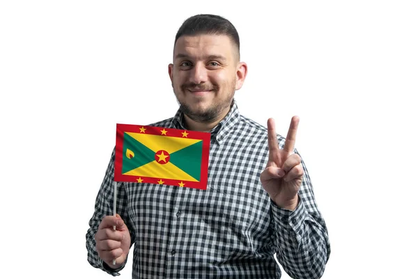 Vit Kille Som Håller Flagga Grenada Och Visar Två Fingrar — Stockfoto