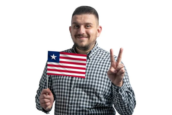 Blanke Man Met Een Vlag Van Liberia Toont Twee Vingers — Stockfoto