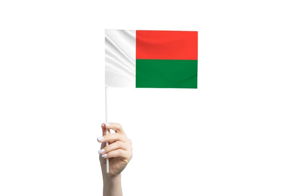 Gyönyörű Női Kéz Kezében Madagaszkár Zászló Elszigetelt Fehér Háttér — Stock Fotó