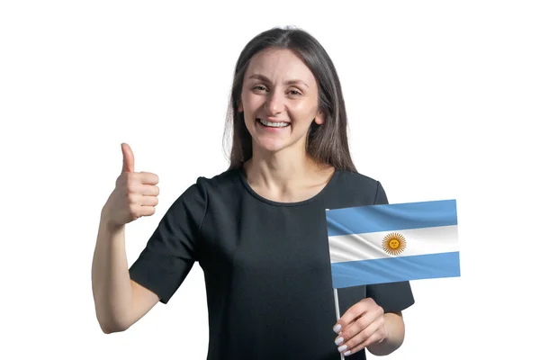 Szczęśliwa Młoda Biała Kobieta Trzyma Flagę Argentyny Pokazuje Klasę Ręcznie — Zdjęcie stockowe