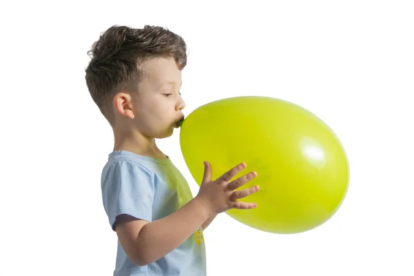 Funny Boy Blowing Yellow Balloon Isolated White Background Royalty Free Stock Photos
