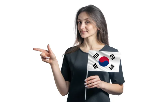 Happy Young White Woman Holding Flag South Korea Points Left — Stock Photo, Image