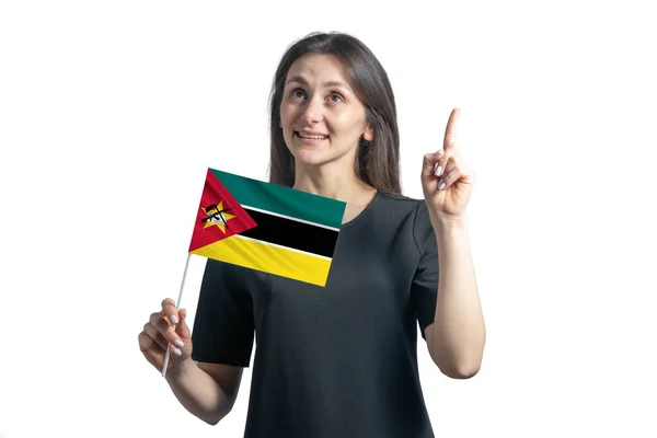 모잠비크의 국기를 배경에 떨어져 손가락을 치켜들고 — 스톡 사진