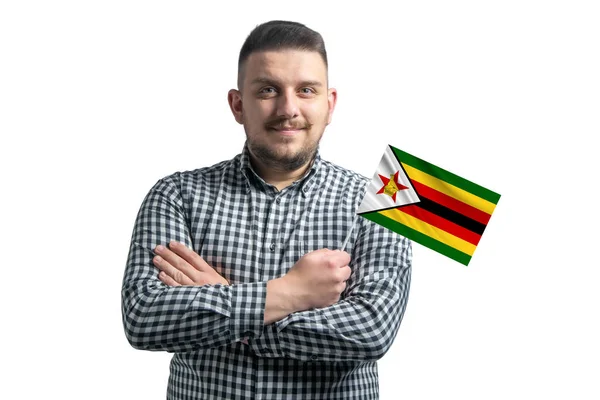 White Guy Holding Flag Zimbabwe Smiling Confident Crossed Arms Isolated — Stock fotografie