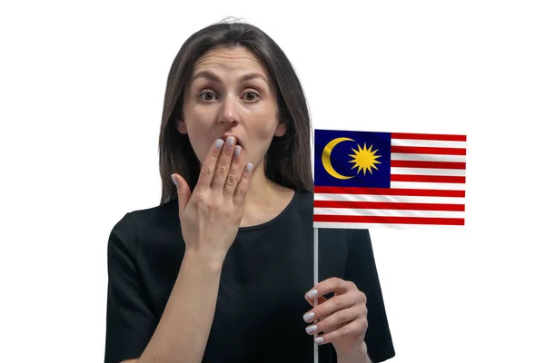 Happy Young White Woman Holding Flag Malaysia Covers Her Mouth — Stock fotografie