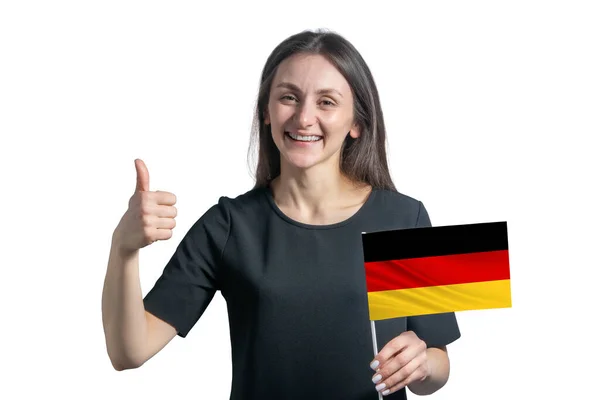 Счастливая Молодая Белая Женщина Держит Флаг Германии Показывает Класс Руки — стоковое фото