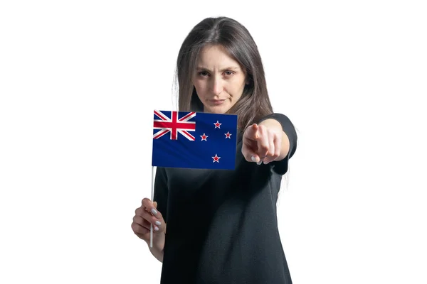 Happy Young White Woman Holding Flag New Zealand Points Forward —  Fotos de Stock