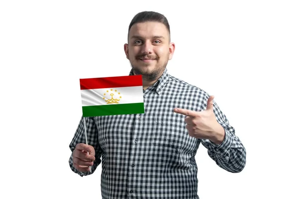 White Guy Holding Flag Tajikistan Points Finger Other Hand Flag — 스톡 사진
