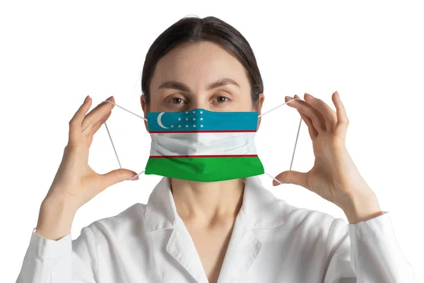 Respirator Flag Uzbekistan Doctor Puts Medical Face Mask Isolated White — Stockfoto