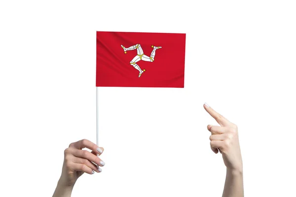 Beautiful Female Hand Holds Isle Man Flag Which She Shows — Fotografia de Stock