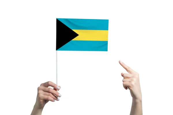 Beautiful Female Hand Holds Bahamas Flag Which She Shows Finger — Stockfoto