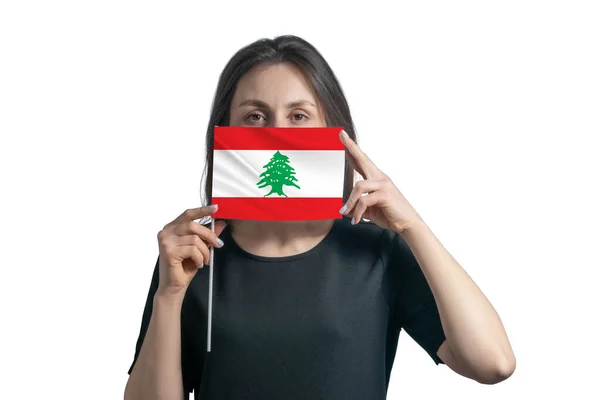 레바논 국기를 배경에 고립된 얼굴로 얼굴을 가리고 — 스톡 사진