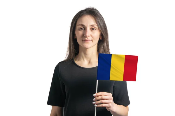 快乐的年轻白人女孩举着罗马尼亚国旗 与白人隔离在一起 — 图库照片