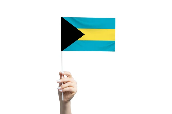 Hermosa Mano Femenina Sosteniendo Bandera Bahamas Aislada Sobre Fondo Blanco — Foto de Stock
