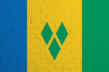 Saint Vincent ve Grenadine bayrağı. Aziz Vincent ve Grenadine bayrağının tuğla duvar dokusu.