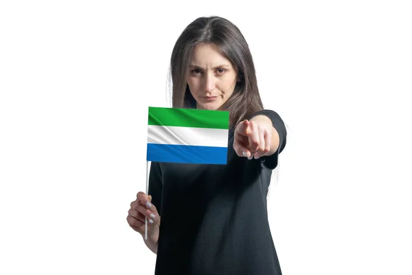 Happy Young White Woman Holding Flag Sierra Leone Points Forward — Stock Photo, Image