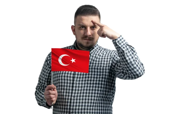 White Guy Holding Flag Turkey Finger Touches Temple Head Isolated — Stock Photo, Image