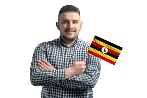 Белый Парень Флагом Уганды Уверенно Улыбающийся Скрещенными Руками Белом Фоне — стоковое фото