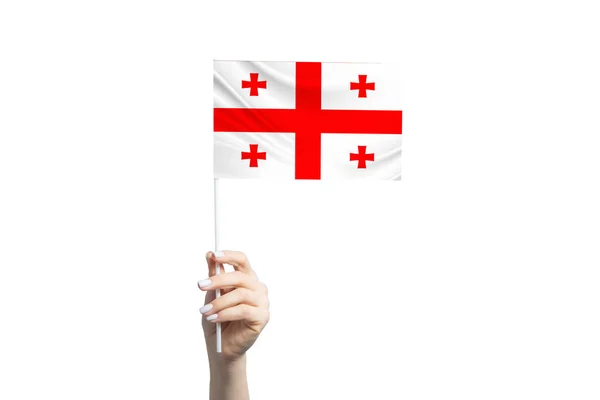 白い背景に隔離されたジョージア国旗を持つ美しい女性の手 — ストック写真