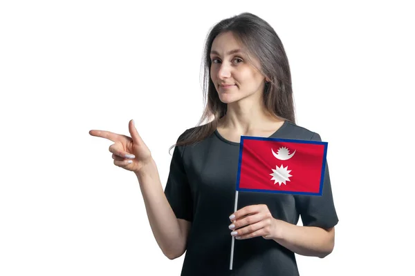 Happy Young White Woman Holding Flag Nepal Points Left Isolated — Stock Photo, Image