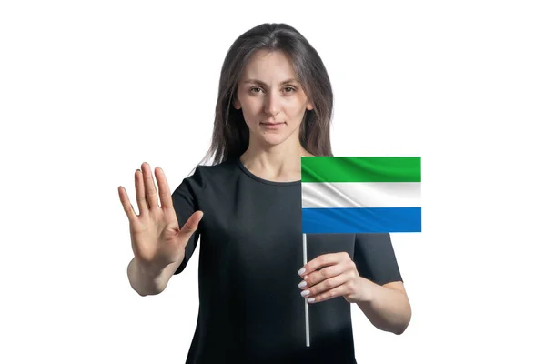 Happy Young White Woman Holding Flag Sierra Leone Serious Face — Stock Photo, Image