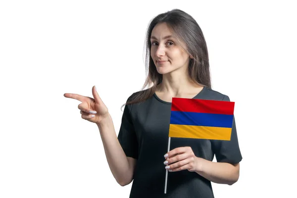 Feliz Joven Blanca Sosteniendo Bandera Armenia Señala Izquierda Aislada Sobre — Foto de Stock