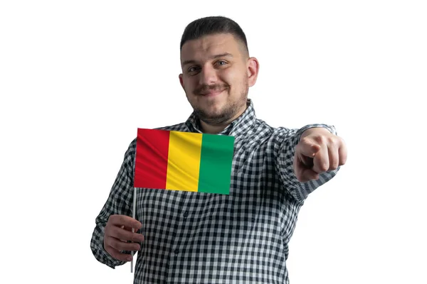 White Guy Holding Flag Guinea Points Forward Front Him Isolated — Stock Photo, Image