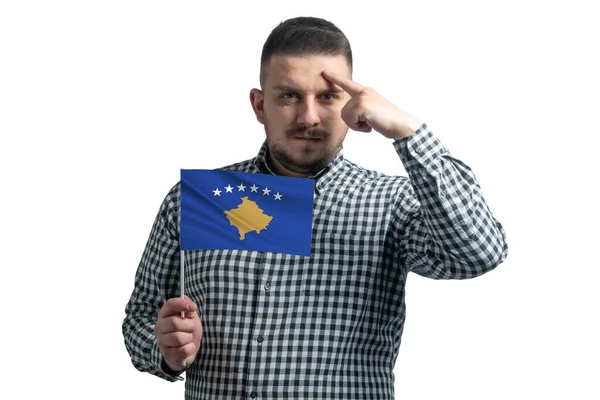 White Guy Holding Flag Kosovo Finger Touches Temple Head Isolated — Fotografia de Stock