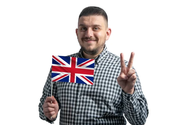 Branco Cara Segurando Uma Bandeira Reino Unido Mostra Dois Dedos — Fotografia de Stock