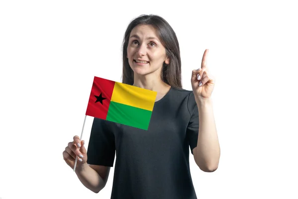 Jovem Mulher Branca Feliz Segurando Bandeira Guiné Bissau Aponta Polegares — Fotografia de Stock
