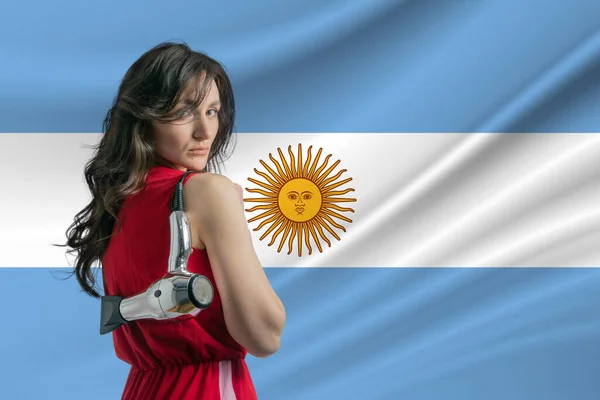 Beauty industry in Argentina. Happy female hairdresser holding hairdryer against Argentina flag background.