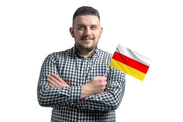 Weißer Mann Mit Einer Flagge Von Südossetien Lächelt Selbstbewusst Mit — Stockfoto