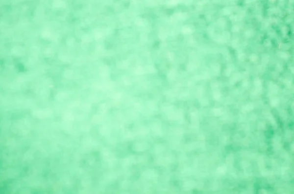 Verde abstract stralucitor estompat fundal — Fotografie, imagine de stoc
