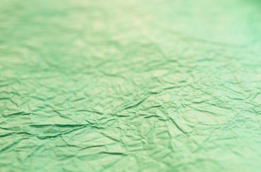 Yeşil buruşuk kağıt arka plan dokusu