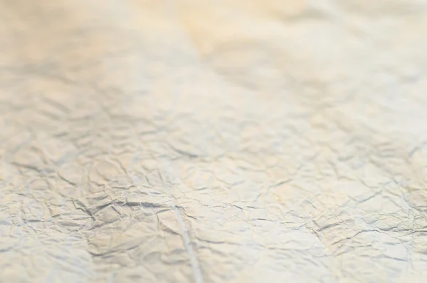 Beige creased paper background texture — Stock Photo, Image