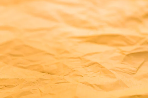 Orange creased paper background texture — Stock Photo, Image