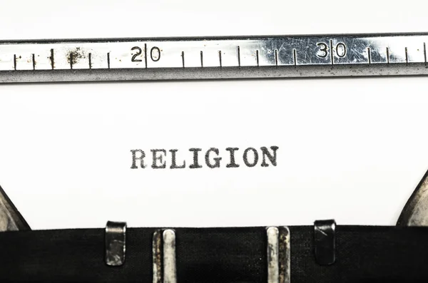 宗教在打字机上键入的词 — 图库照片