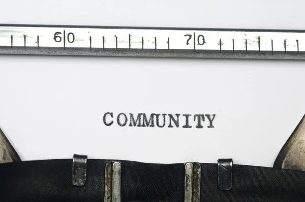 Word community typed on old typewriter — Stock Photo, Image