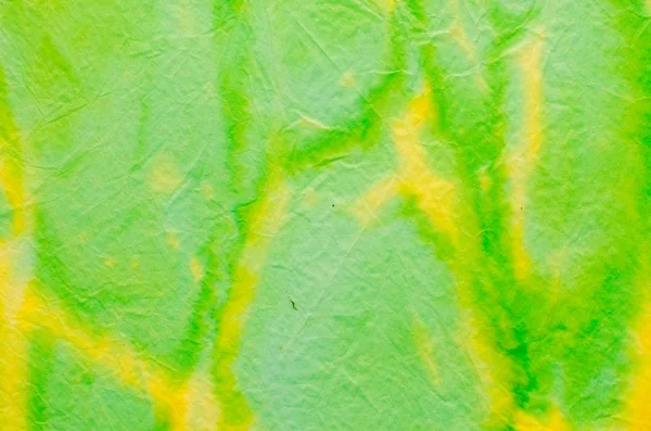 Zelené a žluté malované pozadí krepový papír — Stock fotografie
