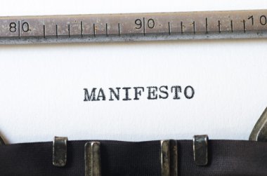 word manifesto typed on typewriter clipart