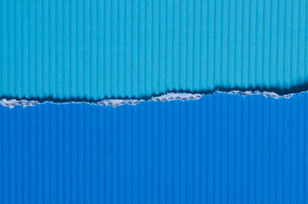 Blue torn paper background texture — Stock Photo, Image