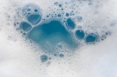 white foam on blue water  clipart