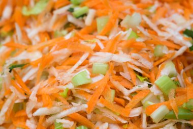 grated and chopped fresh vegetables or soup closeup