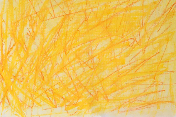 yellow and orange colors pastel crayon doodles on paper background texture