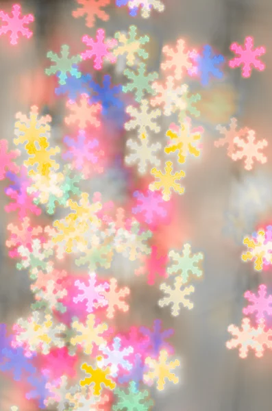 Wazig bokeh sneeuwvlokken achtergrond — Stockfoto